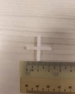 Cross piece for elbow breather tube